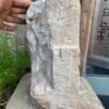 a hand holding a rock