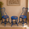 Add a vibrant artistic touch to your space with this handcrafted 3-piece bistro set featuring two vintage-style iron chairs and a matching round table. Finished in a striking blue color with intricate hand-painted floral artwork, this unique set is perfect for balconies, patios, cafés, gardens, and indoor seating areas. Specifications Set Includes: 2 Chairs + 1 Round Table Material: Iron Finish: Hand-Painted Blue Floral Finish Color: Turquoise Blue Style: Vintage / Bohemian / Cottage Suitable For: Balcony, Patio, Garden, Café, Bistro, Indoor Seating Condition: Vintage