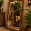 Reclaimed wood floor mirror with vintage carved trim standing against a wall in a living room interior (76 x 43 inches)-collectible vintage