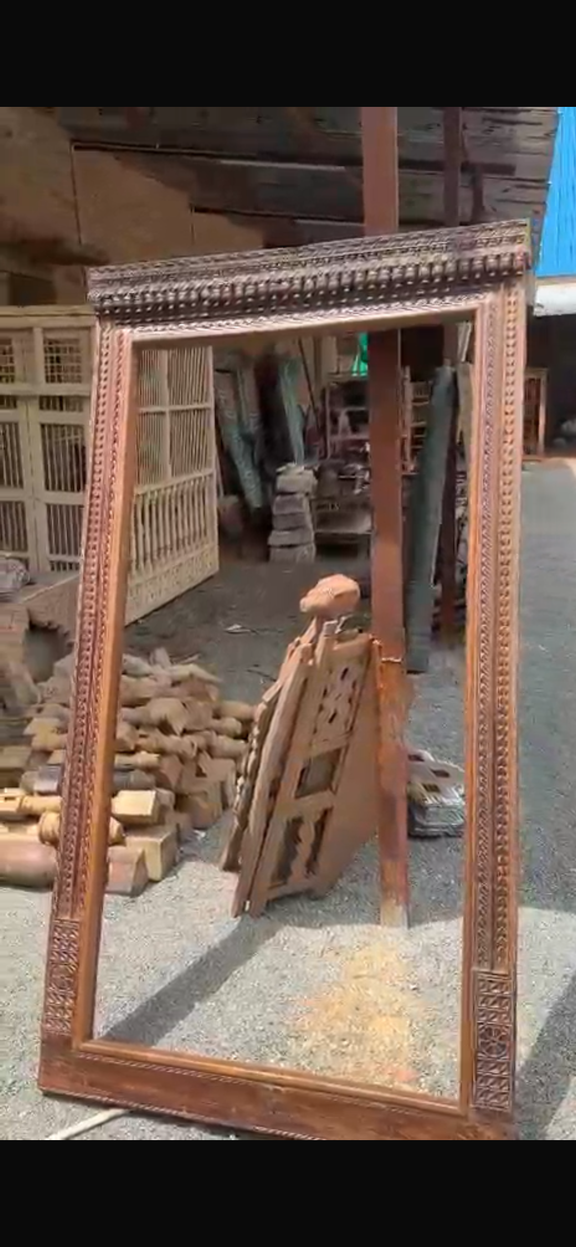Antique teakwood mirror