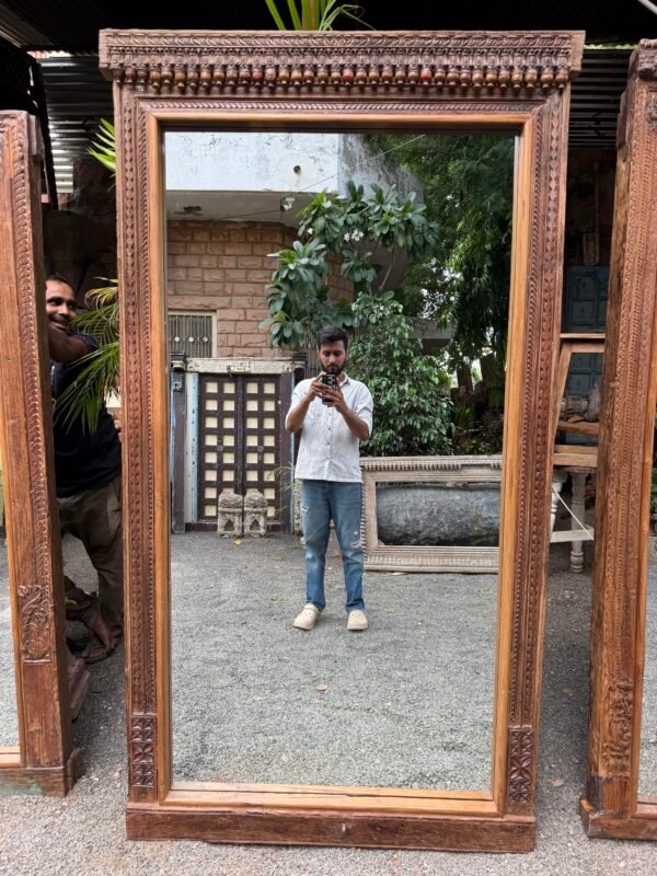 Hand carved wooden floor mirror with traditional vintage finish leaning against a living room wall (80 x 43 inches)-collectible vintage3