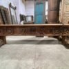 Handcrafted wooden TV unit with intricate carvings, decorative candle niches and rustic antique finish-COLLECTIBLE VINTAGE